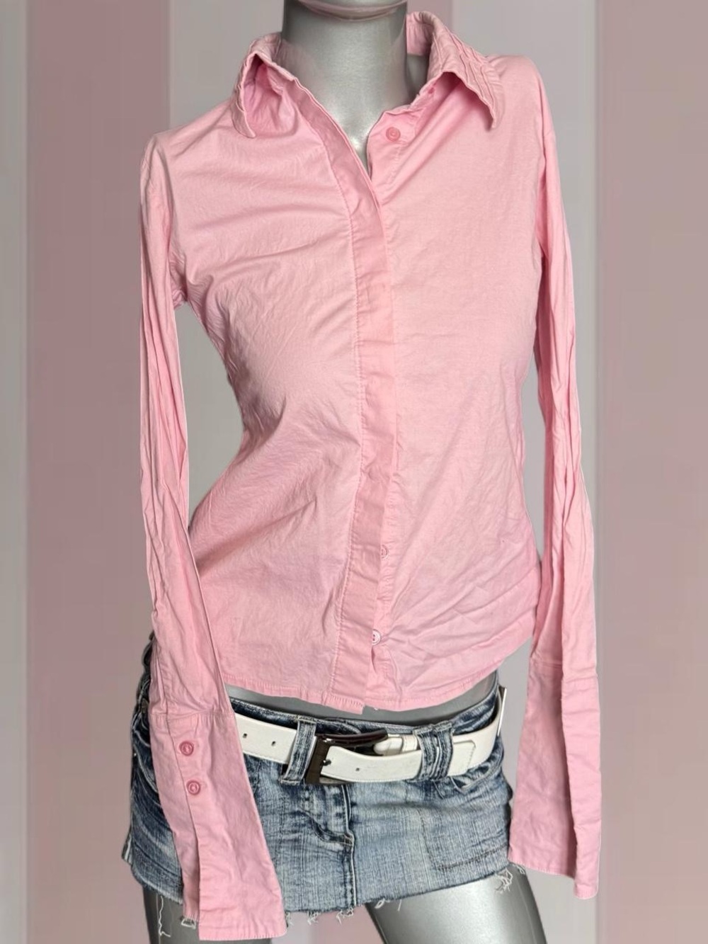 Pink button up shirt with subtle vertical stripes